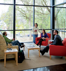 Group of students sitting in Olson Campus Center coffee shop and talking