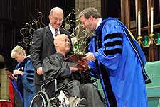 Student responder and M.Div. graduate Scott Nocton receives his diploma from President Richard Bliese.