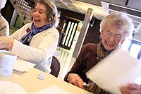 Doris Bass and Florence Hopp have fun while they work.