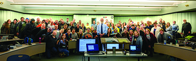 Professor Craig Koester ‘80 M.Div. (standing at center) poses with students from his Genesis to Revelation course.