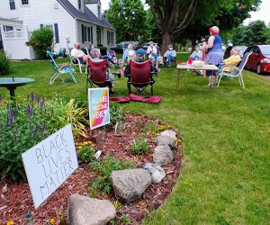 A small group from Associate Church in Owatonna, Minnesota. Gathered during the summer. 