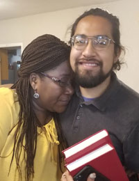 Two Luther Seminary international students hugging