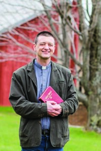 Micah Cavaleri ‘21 M.Div. outside Grace Lutheran Church in South Range, Michigan, where he has served since 2018.