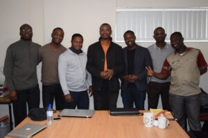 Kwiyani (middle) with Ghanaian students in Birmingham, England(courtesy photo)